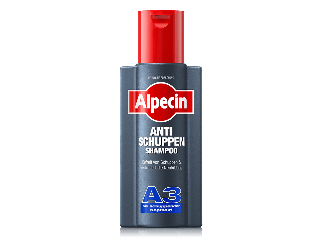 Vorderseite der Alpecin A3 Anti-Schuppen Shampoo-Flasche mit rotem Deckel. Dunkelblaues Design mit weißem Alpecin-Logo, darunter Anti Schuppen Shampoo und Hinweis auf schuppenfreie Kopfhaut.